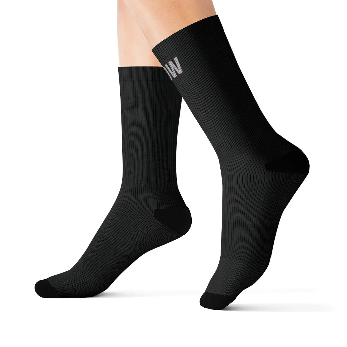 Black MEOW socks on feet